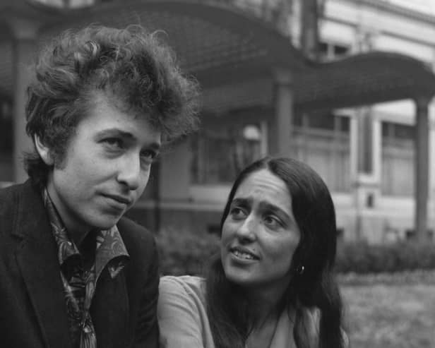Bob Dylan with Joan Baez in Embankment Gardens, London, in 1965. (Photo by Keystone/Getty Images)