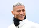 Richarlison of Tottenham Hotspur smiles during a Tottenham Hotspur training session (Photo by Alex Davidson/Getty Images)