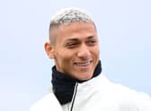 Richarlison of Tottenham Hotspur smiles during a Tottenham Hotspur training session (Photo by Alex Davidson/Getty Images)