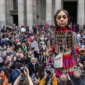 Little Amal is a giant puppet of a 10-year-old Syrian refugee girl. Credit: Getty Images