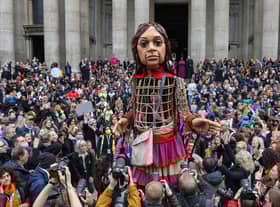 Little Amal is a giant puppet of a 10-year-old Syrian refugee girl. Credit: Getty Images
