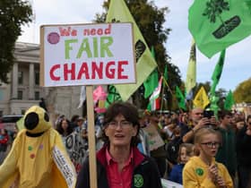 Demonstrators hold placards during an Extinction Rebellion march in London.
