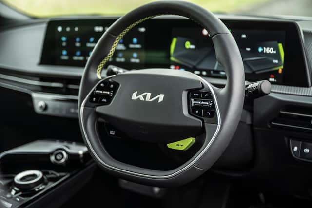 Neon green highlights and a GT mod button are unique to this model (Photo: Kia)