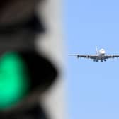 An airplane coming into Heathrow Airport, on the outskirts of west London. Credit: Damien Meyer/AFP via Getty Images.
