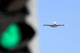 An airplane coming into Heathrow Airport, on the outskirts of west London. Credit: Damien Meyer/AFP via Getty Images.