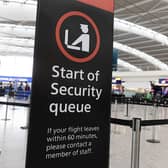 A sign indicating the start of the security queue during a strike by security workers at London Heathrow Airport in London, UK, on Friday, March 31, 2023. IAG SAsÂ British AirwaysÂ is set to scrap 320 flights during the Easter week as security workers strike for 10-days over pay. Photographer: Chris Ratcliffe/Bloomberg via Getty Images