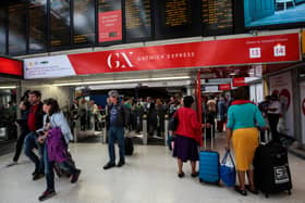 Passengers at the Gatwick Express in Victoria Station.  (Photo by Jack Taylor/Getty Images)