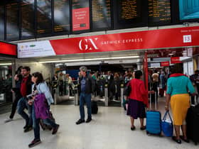 Passengers at the Gatwick Express in Victoria Station.  (Photo by Jack Taylor/Getty Images)