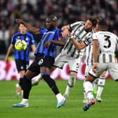  Romelu Lukaku of FC Internazionale holds off Manuel Locatelli of Juventus during the Coppa  (Photo by Valerio Pennicino/Getty Images)