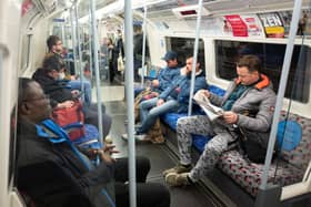 Passengers on the London Underground Jubilee line. (Photo by Leon Neal/Getty Images)