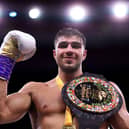 Tommy Fury poses for a photo with their Title Belt after defeating Jake Paul during the Cruiserweight Title fight between Jake Paul and Tommy Fury at the Diriyah Arena on February 26, 2023 in Riyadh, Saudi Arabia. (Photo by Francois Nel/Getty Images)