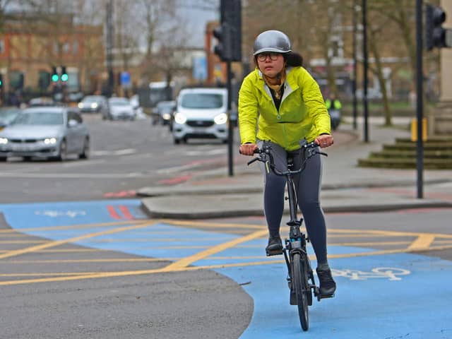 A cyclist riding their bike on a cycleway in south London. Credit: Susannah Ireland/AFP via Getty Images.