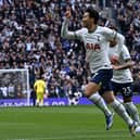 Tottenham Hotspur's South Korean striker Son Heung-Min (C) celebrates after scoring the opening goal (Photo by BEN STANSALL/AFP via Getty Images)