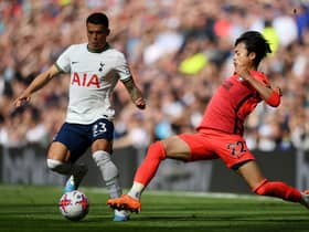  Pedro Porro of Tottenham Hotspur is challenged by Kaoru Mitoma of Brighton & Hove Albion during the Premier League match . (Photo by Justin Setterfield/Getty Images)