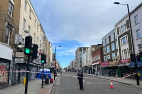 A police cordon in Kingsland High Street after a man died with a head wound. 