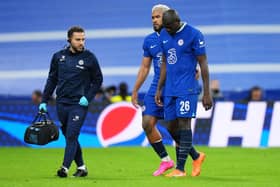  Kalidou Koulibaly of Chelsea leaves the field, whilst being consoled by Reece James  (Photo by Angel Martinez/Getty Images)