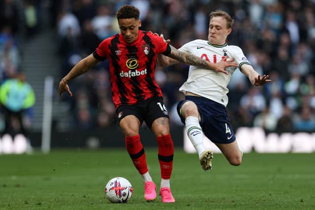 Bournemouth’s English midfielder Marcus Tavernier fights for the ball with Tottenham Hotspur’s Oliver Skipp. (Photo by Adrian Dennis/AFP via Getty Images)