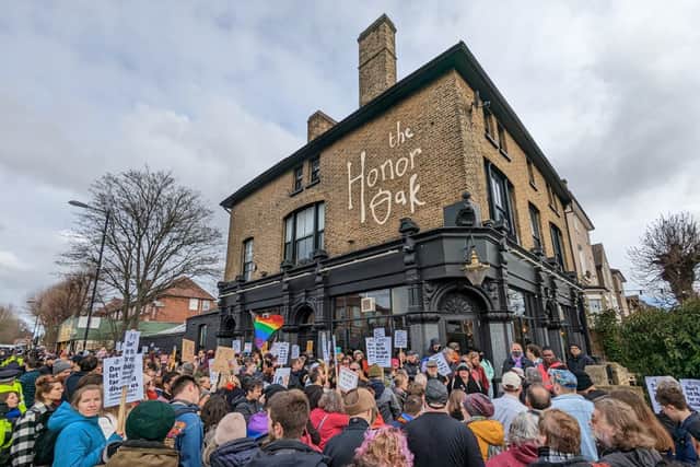 Protestors from opposing sides gather outside the Honor Oak pub on February 25. Credit: Ferdinand Kingsley