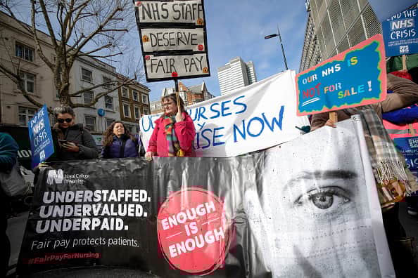 Members of the Royal College of Nursing union could strike until Christmas if no deal is reached with the government over pay. (Photo by Hesther Ng/SOPA Images/LightRocket via Getty Images)