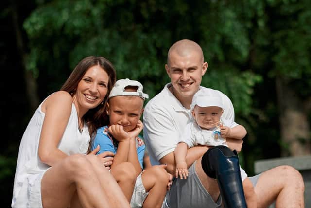 Roman Kashpur (right) with his wife Yulia (left) and their two sons Ivan (left) and Olesksandr. Credit: Roman Kashpur