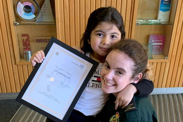 Zaynab and call handler Natasha. (Photo by London Ambulance Service / SWNS)