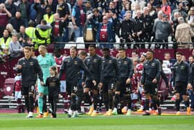 The young mascot later walked out holding the hand of Martin Odegaard (Image: Getty Images)