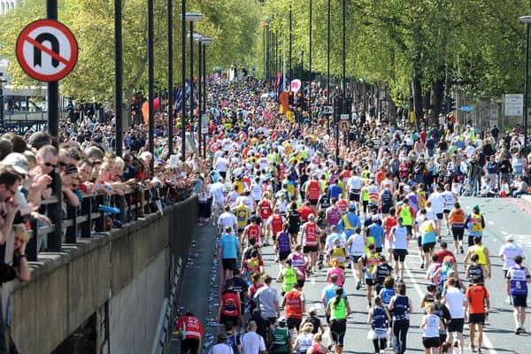 Spectators line the streets at Blackfriars to watch Marathon runners