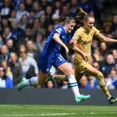 Maren Mjelde of Chelsea and Caroline Graham Hansen of FC Barcelona battle for possession during the UEFA Women’s Champions League semifinal 1st leg match between Chelsea FC and FC Barcelona at Stamford Bridge.
