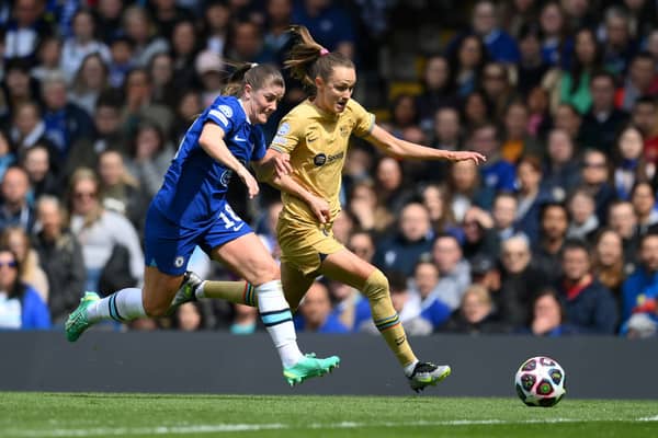 Maren Mjelde of Chelsea and Caroline Graham Hansen of FC Barcelona battle for possession during the UEFA Women’s Champions League semifinal 1st leg match between Chelsea FC and FC Barcelona at Stamford Bridge.