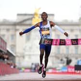 Kelvin Kiptum of Kenya crosses the finish line to win the Elite Men’s Marathon. (Photo by Alex Davidson/Getty Images)
