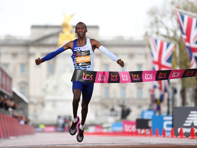 Kelvin Kiptum of Kenya crosses the finish line to win the Elite Men’s Marathon. (Photo by Alex Davidson/Getty Images)