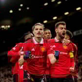 Marcel Sabitzer of Manchester United  celebrates scoring a goal to make the score 1-0 with his team-mates (Photo by Ash Donelon/Manchester United via Getty Images)