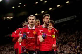 Marcel Sabitzer of Manchester United  celebrates scoring a goal to make the score 1-0 with his team-mates (Photo by Ash Donelon/Manchester United via Getty Images)