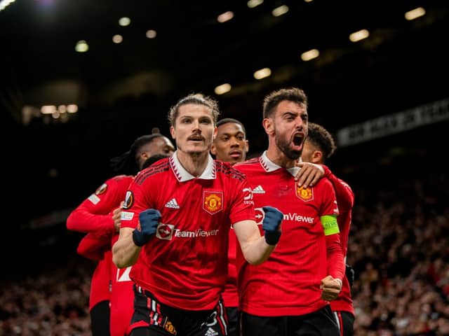 Marcel Sabitzer of Manchester United  celebrates scoring a goal to make the score 1-0 with his team-mates (Photo by Ash Donelon/Manchester United via Getty Images)