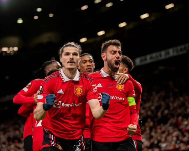 Marcel Sabitzer of Manchester United  celebrates scoring a goal to make the score 1-0 with his team-mates (Photo by Ash Donelon/Manchester United via Getty Images)