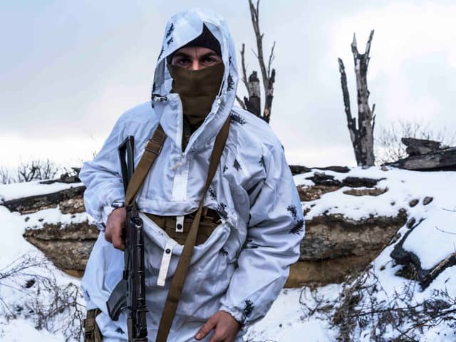 A Ukranian soldier in a trench in the east of the country (photo: Brendan Hoffman/Getty Images)