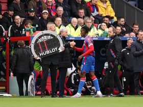 Wilfried Zaha of Crystal Palace is subbed off after picking up an injury during the Premier League match  (Photo by Ryan Pierse/Getty Images)