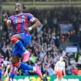 Crystal Palace’s Ivorian striker Wilfried Zaha celebrates after scoring their second goal  (Photo by JUSTIN TALLIS/AFP via Getty Images)