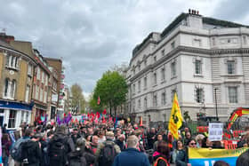 The march comes down Clerkenwell Road, past Farringdon.