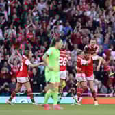 The players celebrate Jen Beattie’s late equaliser against Wolfsburg. (Photo by Richard Heathcote/Getty Images)