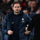 Chelsea’s English caretaker manager Frank Lampard (L) congratulates Arsenal’s Spanish manager Mikel Arteta  (Photo by BEN STANSALL/AFP via Getty Images)