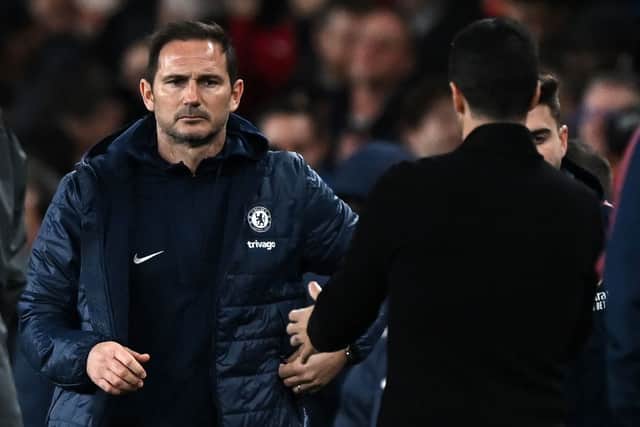 Chelsea’s English caretaker manager Frank Lampard (L) congratulates Arsenal’s Spanish manager Mikel Arteta  (Photo by BEN STANSALL/AFP via Getty Images)