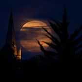 The Flower Moon of May 2020 (which was also a ‘supermoon’) rising above the village of Brixworth (Photo: Clive Mason/Getty Images)