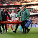 Laura Wienroither of Arsenal leaves the field on a stretcher after receiving medical treatment during the UEFA Women's Champions League semi-final 2nd leg match between Arsenal and VfL Wolfsburg at Emirates Stadium on May 01, 2023 in London, England. (Photo by Richard Heathcote/Getty Images)