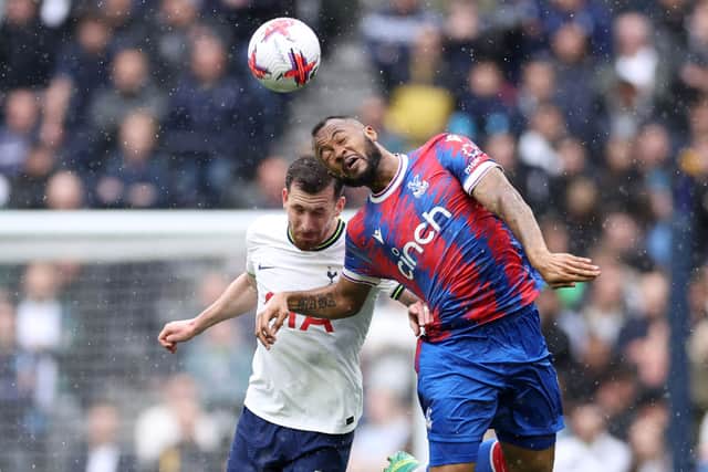 Jordan Ayew of Crystal Palace jumps for the ball with Pierre-Emile Hojbjerg of Tottenham Hotspur. (Photo by Warren Little/Getty Images)