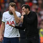 Tottenham Hotspur's Interim head coach Ryan Mason (R) speaks with Tottenham Hotspur's English striker Harry Kane  (Photo by PAUL ELLIS/AFP via Getty Images)