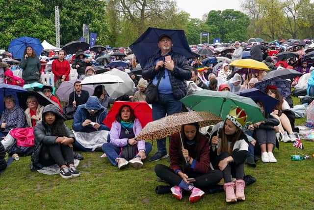 Royal fans braving the rain at Hyde Park