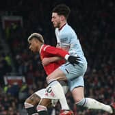  Marcus Rashford of Manchester United in action with Declan Rice of West Ham United during the Premier League match between Manchester United and West Ham United at Old Trafford on January 22, 2022 in Manchester, England. (Photo by Matthew Peters/Manchester United via Getty Images)