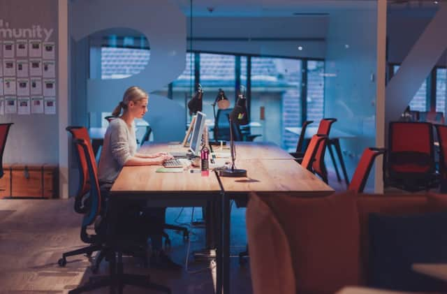 Businesswoman working at night