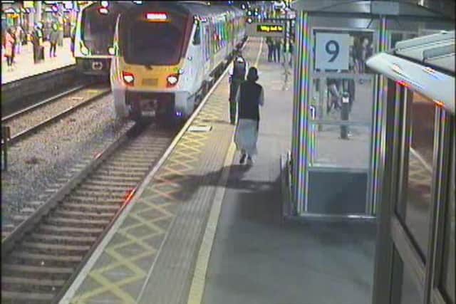 Matthew King  recording officers at train stations. Credit: Met Police